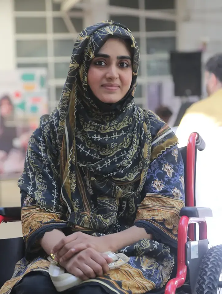 Sairah Amro displaying a garment she stitched